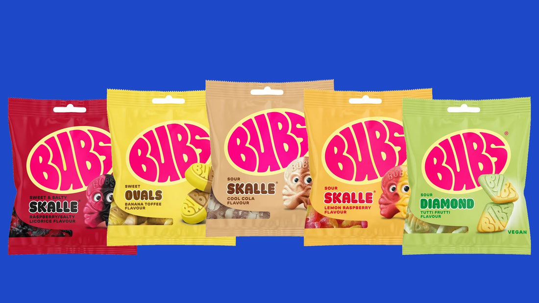 The five new BUBS 156g bags lined up: Raspberry Salty Licorice Skalle, Banana Toffee Ovals, Cool Cola Skalle, Lemon Raspberry Skalle and Tutti Frutti Diamond